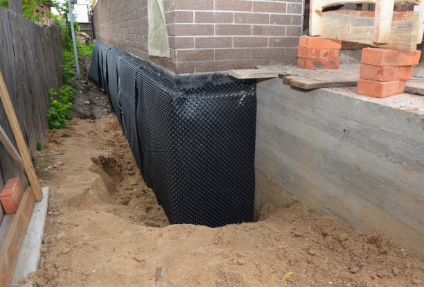 Happy homeowners after waterproofing job in Rosenhayn